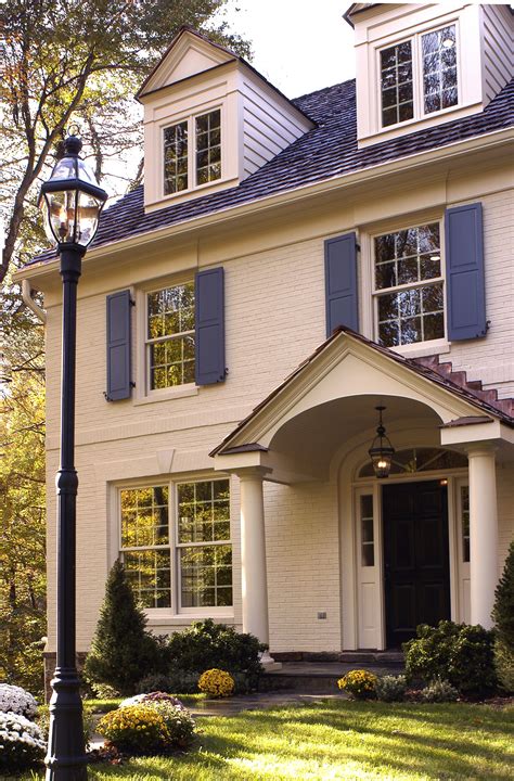 colonial blue shutters white house.